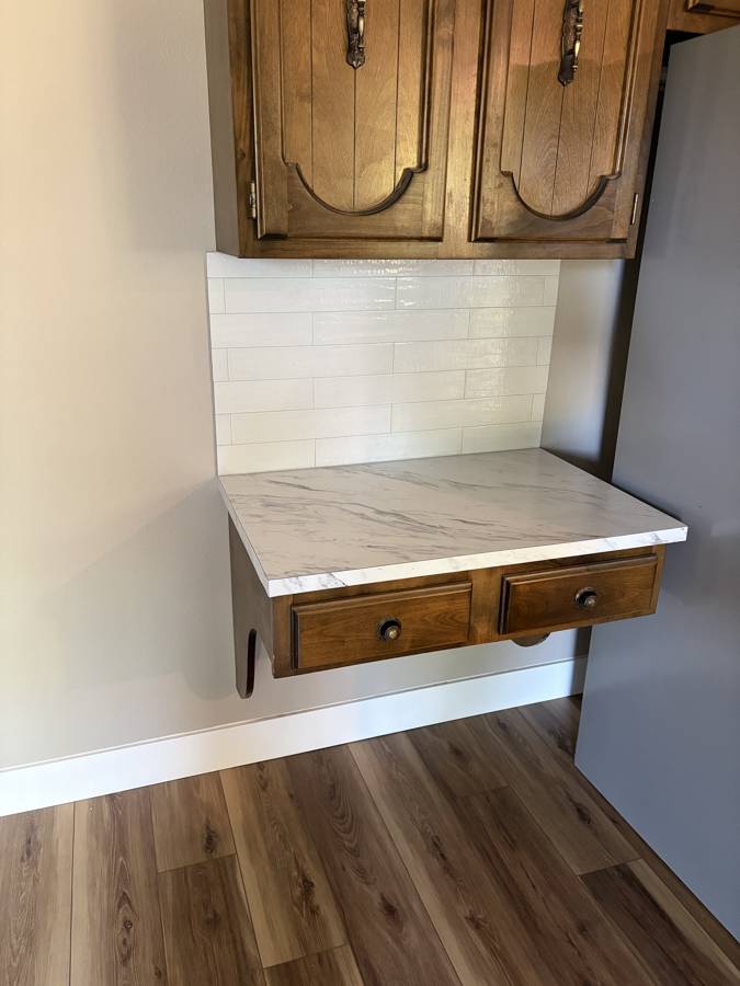 Kitchen desk nook with new countertop and tile backsplash