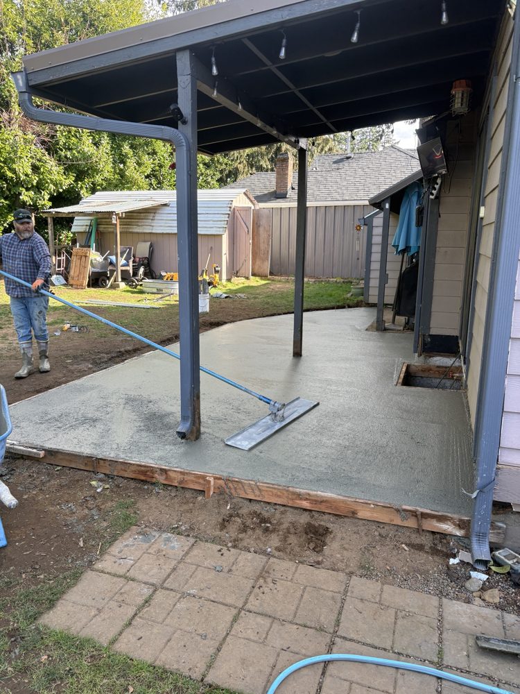 Screeding a new covered patio around the porch posts