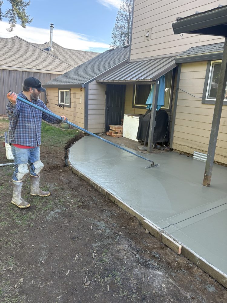 Bull-floating the curved edge of the new patio