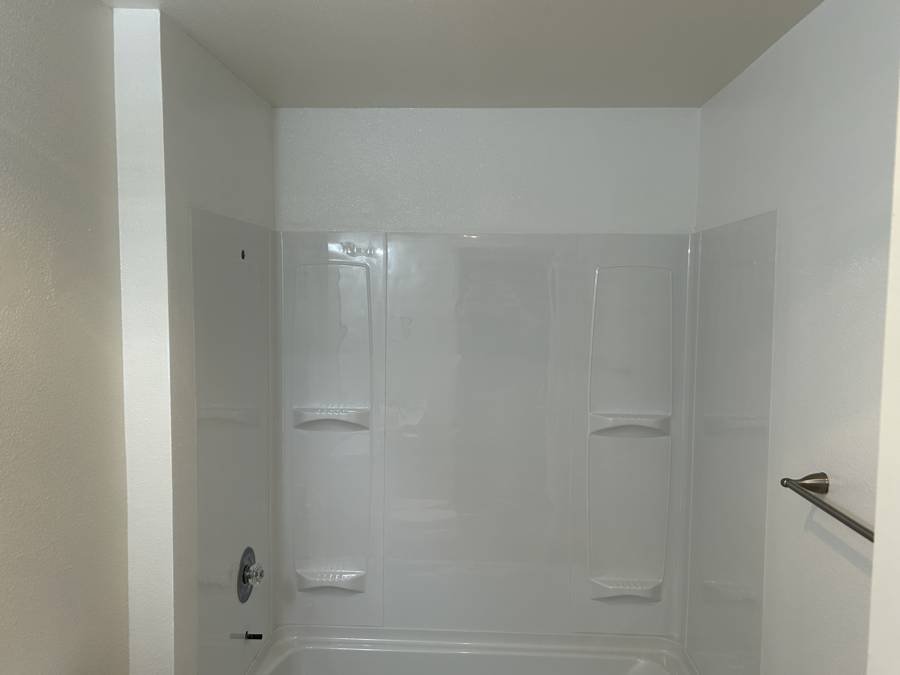 New white tub surround and fresh paint