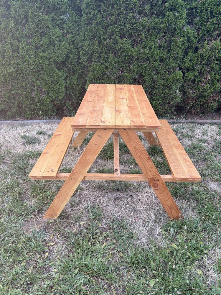 Handbuilt wooden picnic table, front view