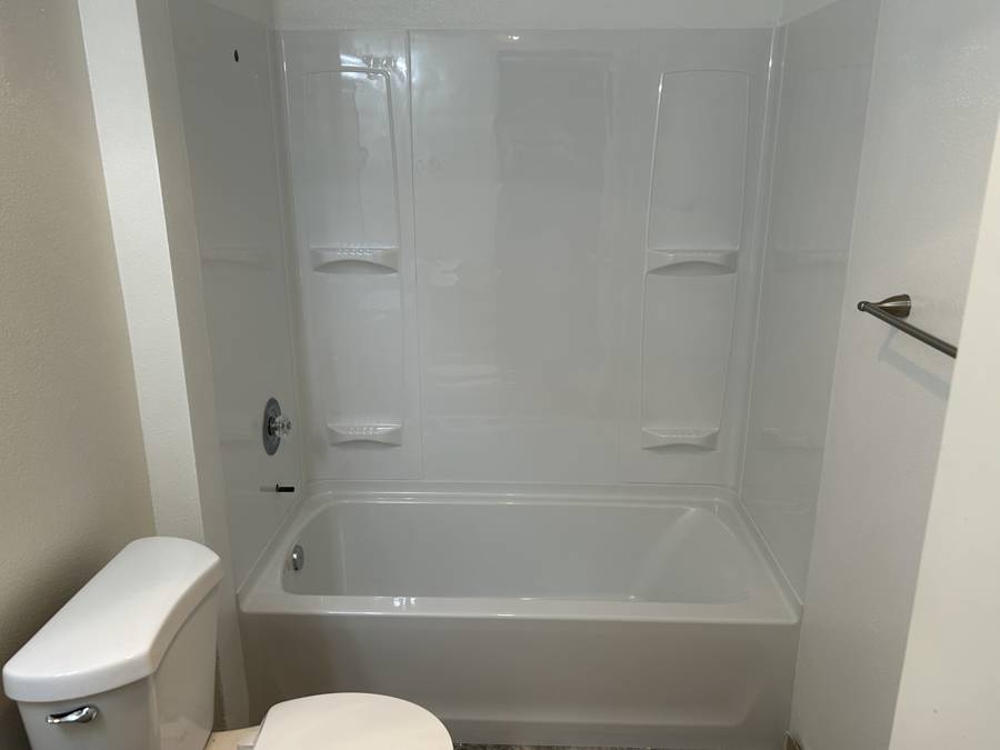 After: new tub, surround and fresh paint