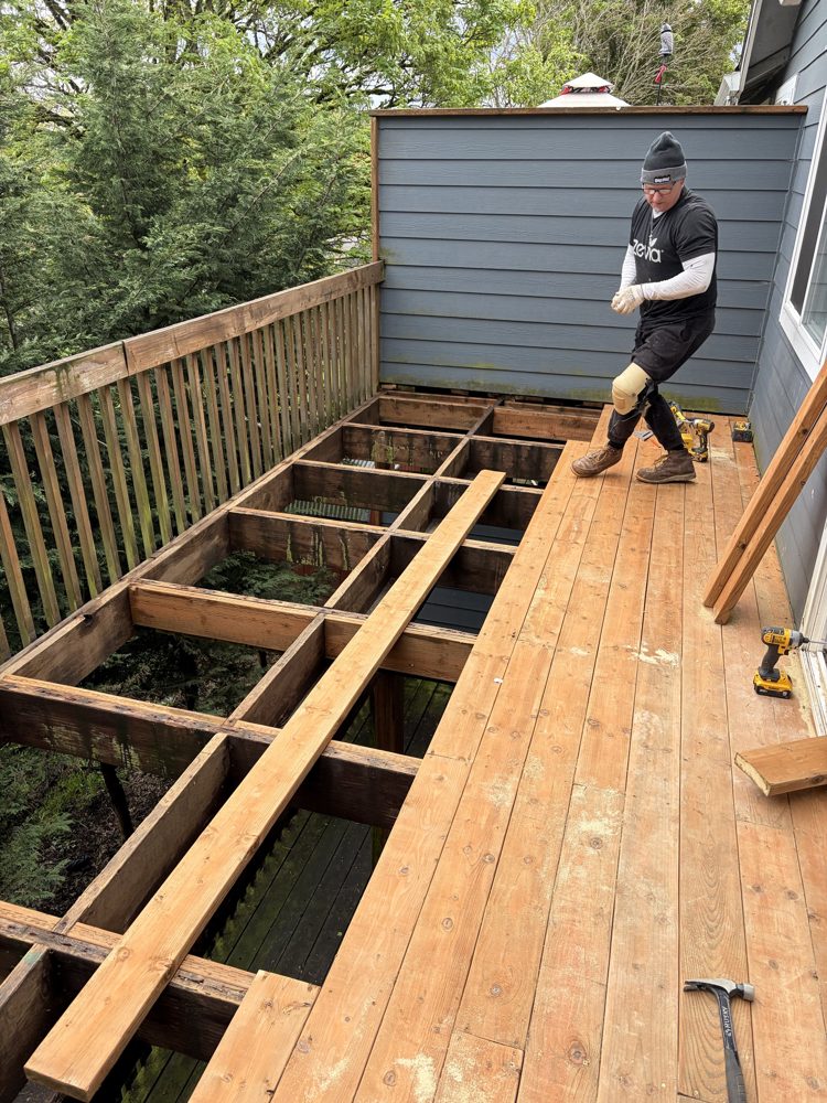 During: new deck boards going down over the framing