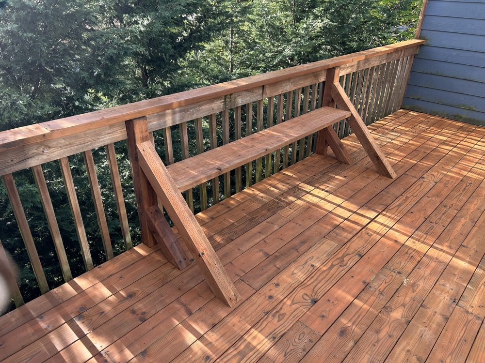 Rebuilt deck and built-in bench with fresh stain