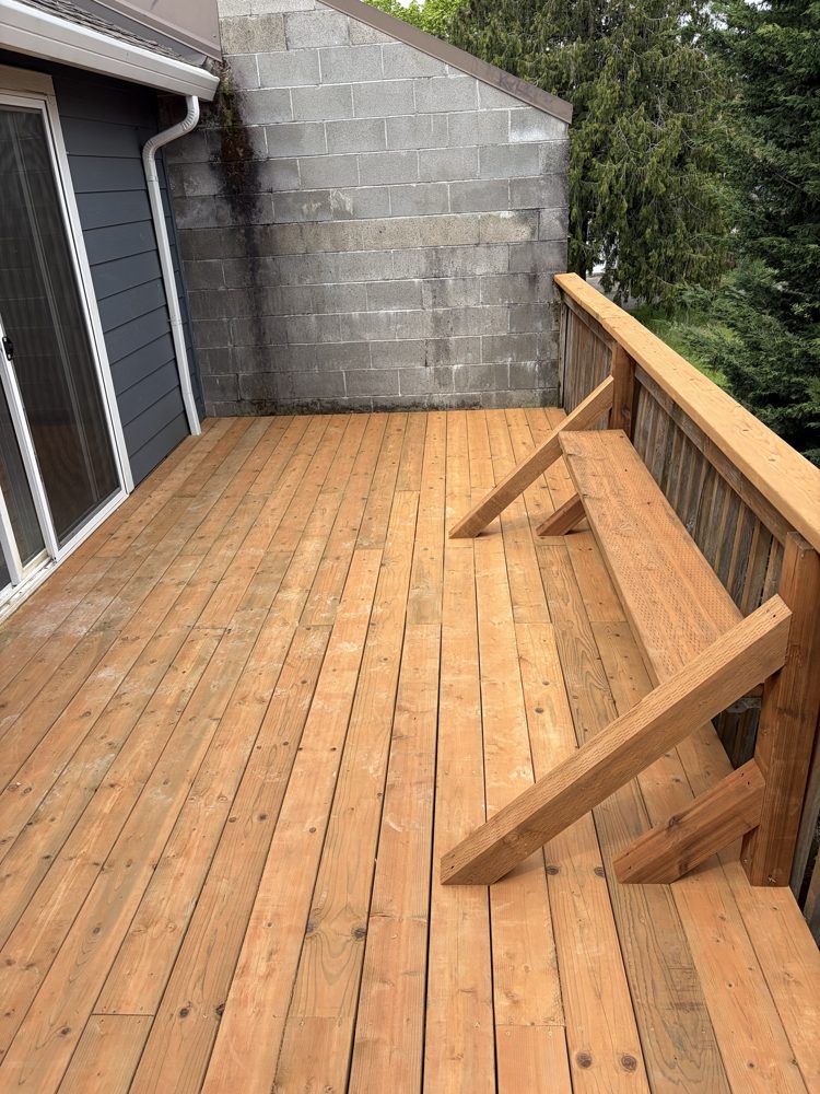 After: new deck beside the sliding door and the rebuilt bench