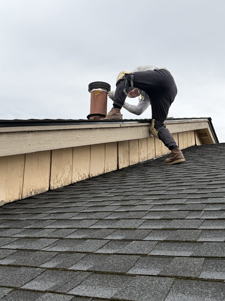 Repairing a roof vent stack on a shingle roof