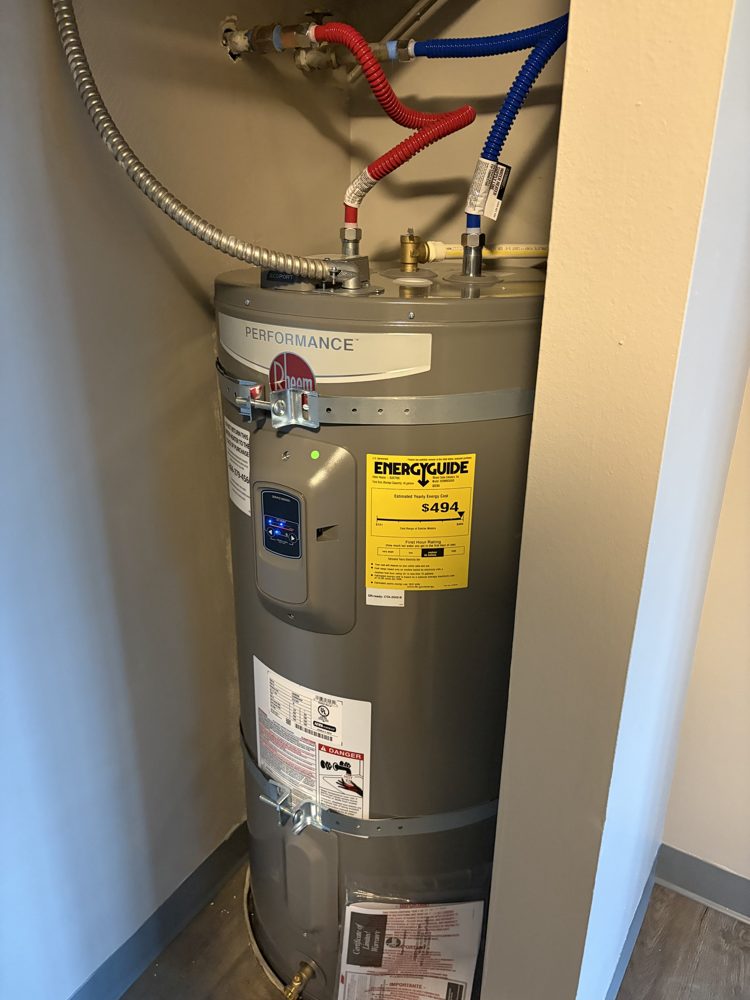 New electric water heater with seismic straps and new hot and cold supply lines